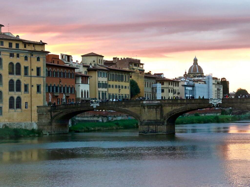 sunset over the Arno River Florence Italy Carol Ketelson Delectable Destinations Culinary Tours