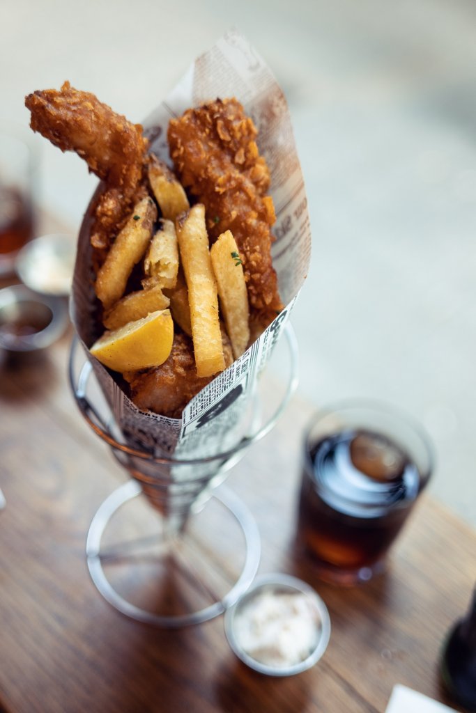 Fish and chips in newspaper cone 